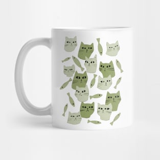 Strange green cats with black eyes and green fish Mug